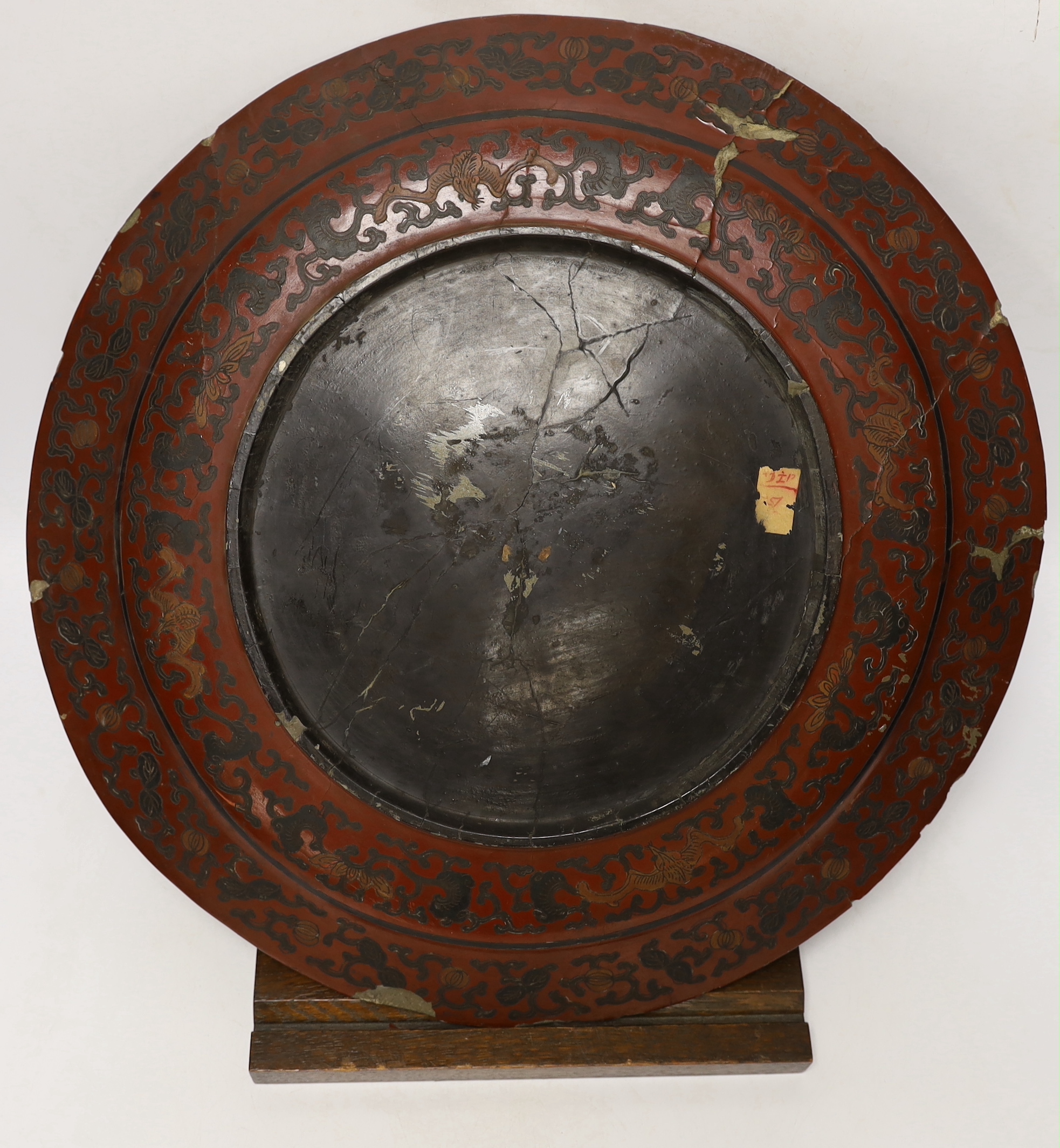 An 18th century Chinese polychrome lacquer large dish on stand, 45.5cm